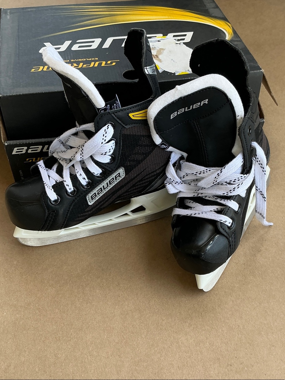 Bauer black and white Supreme ice skates Youth